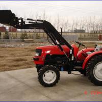 Large picture tractor with front loader and backhoe